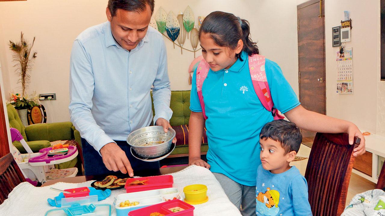 Chartered accountant Dilkhush Shah packs lunch for his two children every day, and the lunchboxes  are loved equally by friends and teachers at school. Pics/Satej Shinde