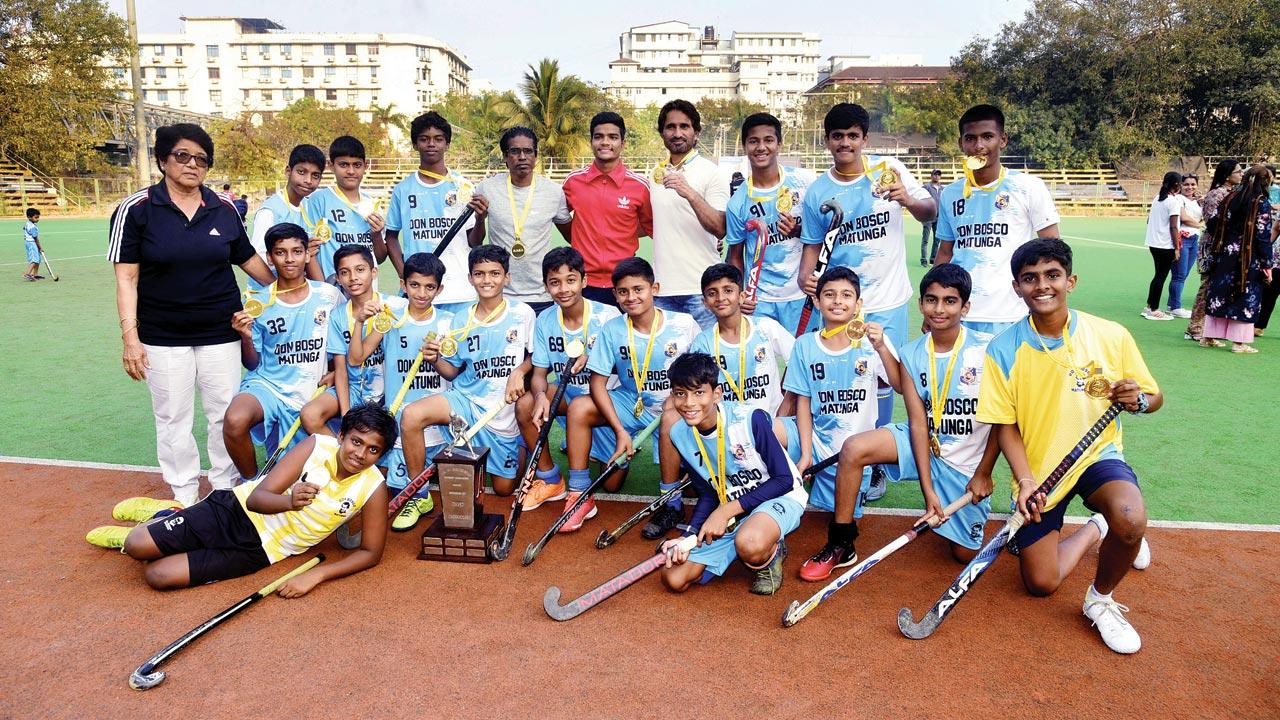 The Don Bosco U-14 team with the Fr Donnellly Cup. Pic/Atul Kamble