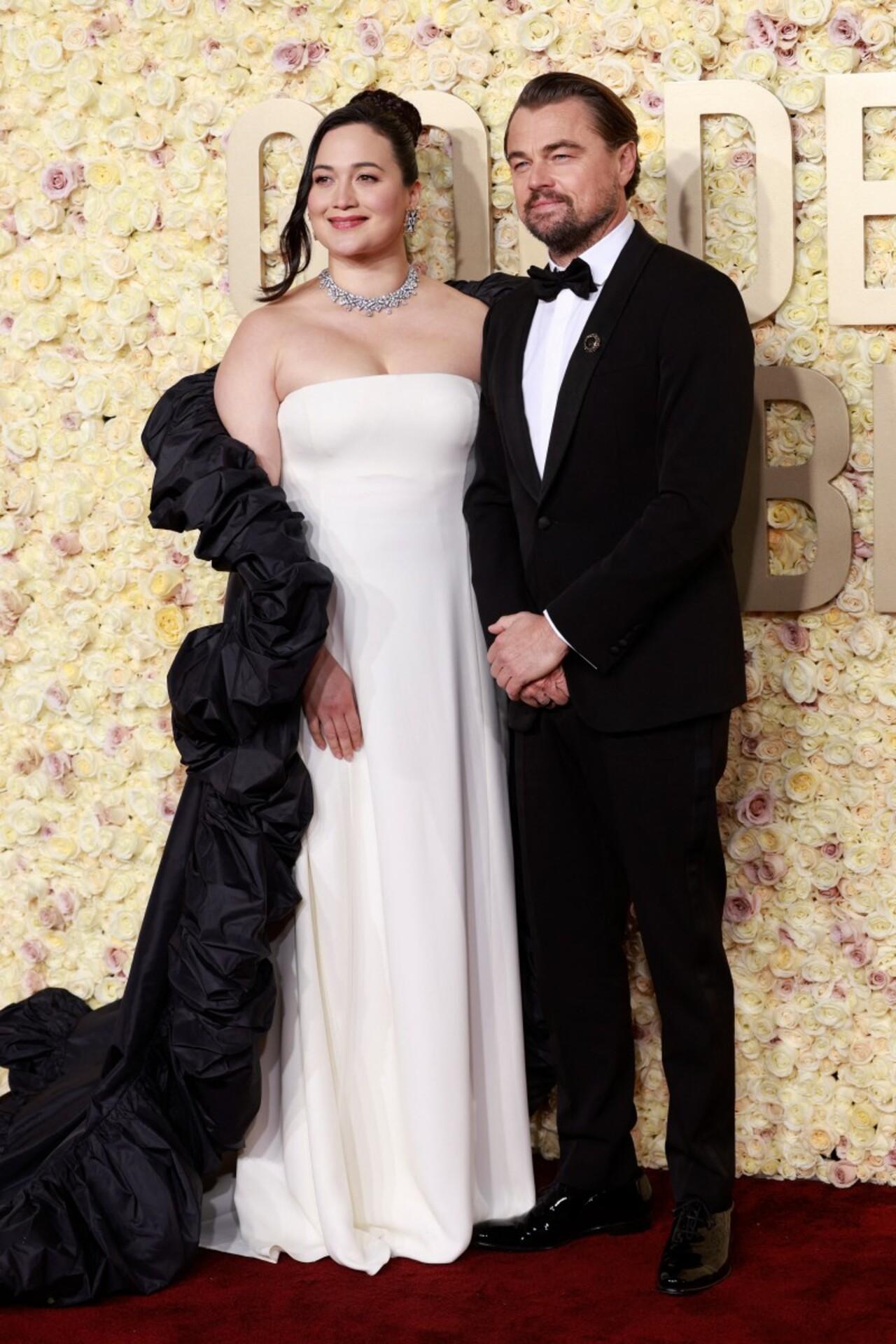 'Killer Of The Flower Moon' co-stars Lily Gladstone and Leonardo DiCaprio struck poses on the red carpet in coordinated outfits