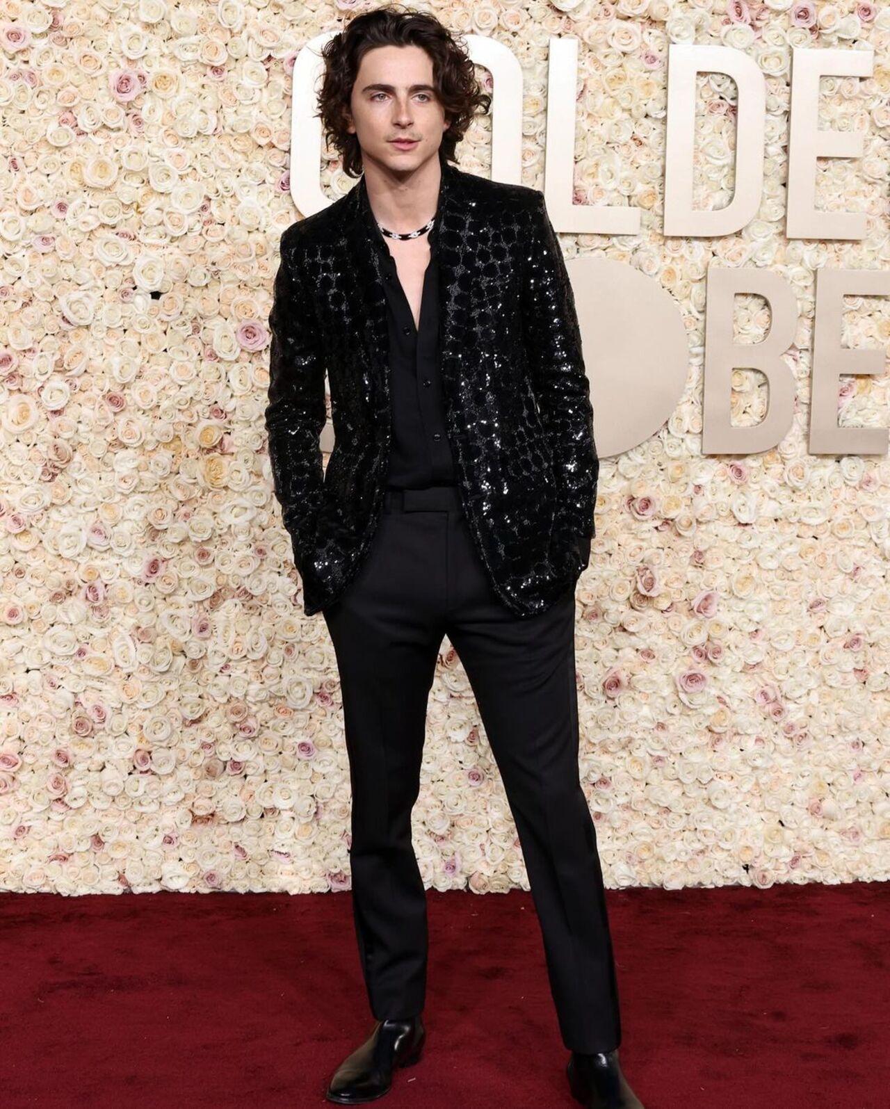 Timothee Chalamet wore a black suit and stood out with the bling element on them. The actor made headline for his heartwarming moments with girlfriend Kylie Jenner