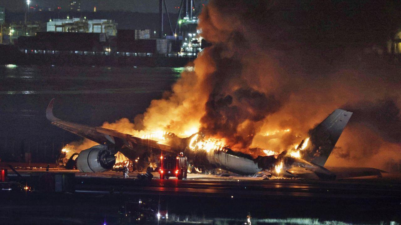 A large passenger plane and a Japanese Coast Guard aircraft collided on runway at Tokyo's Haneda Airport on Tuesday and burst into flames, killing five people.