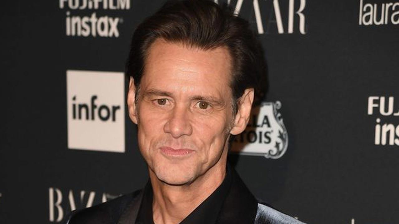 Jim Carrey rocks long hair at birthday meal with friends