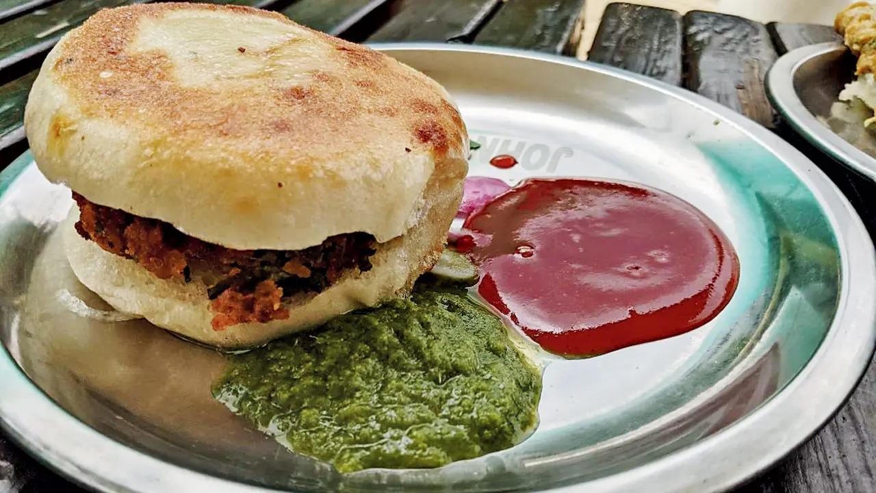 Hot dogOkay, so this isn’t your grilled sausage served in the slit of a partially sliced bun. More of a misnomer, this one at Jony Hot Dog by Vikay Singh Rathore, aka Dadu, is a desi-style cutlet served in bread and loaded with chutneys and sliced onion. There are veg, chicken and mutton variants, and there’s egg banjo, which was slightly salty for our liking, but the burger... er, the hot dog was absolutely worth the try