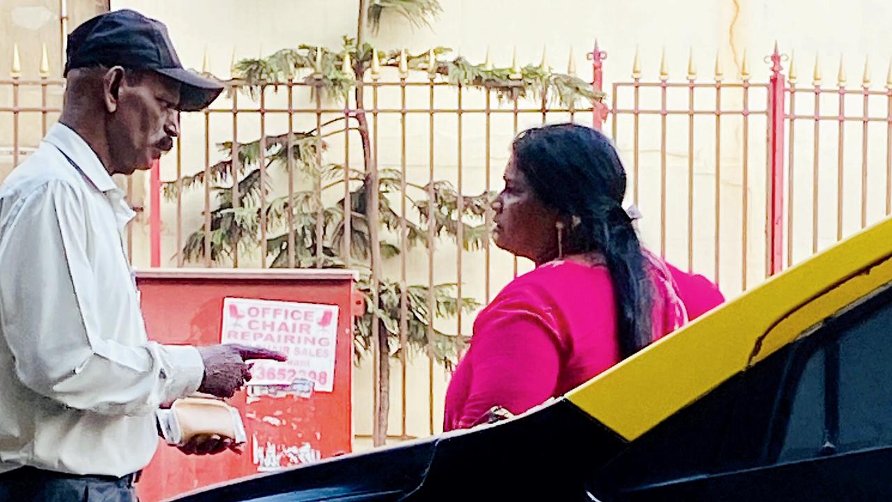 A man getting notes exchanged from a female agent