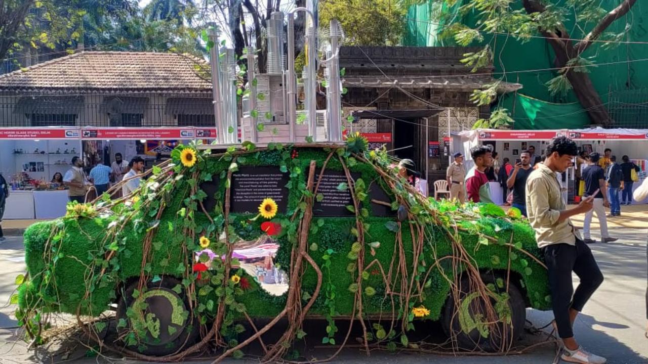 'Plastic Plants' is one of the other striking installations, which was a popular attraction for the festival attendees as it caught their attention with bright greenery covering a car with exhaust fume pipes on the roof of the car. The installation probes environmental pollution from the aspect of fake plants, and the word 'plants' refers to toxic chemical plants and its effect on the environment