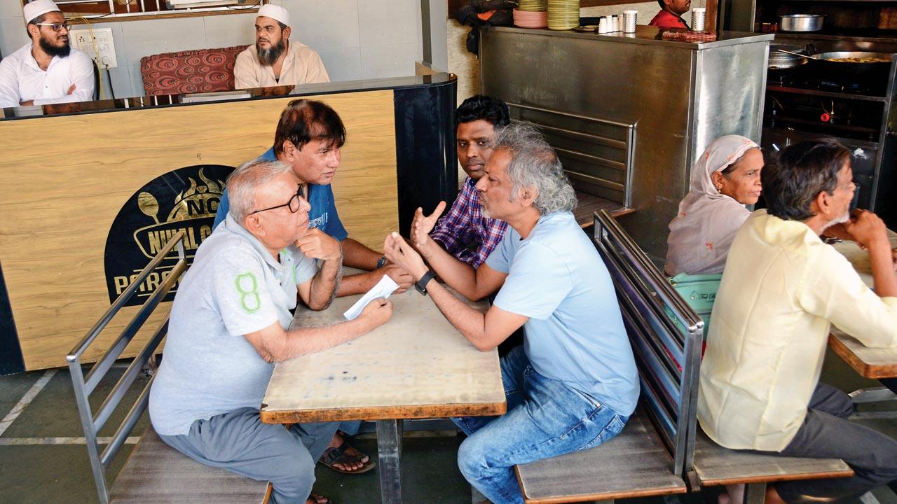 (From left) Journalist Mushrif Shamsi, writer Pulak Chakravarti and novelist Rahman Abbas regularly gather at Nihal Corner, one of the oldest restaurants in the locality, for lengthy discussions about everything under the sun. Other locals like activist Sadiq Pasha drop in frequently.  Pics/Sayyed Sameer Abedi