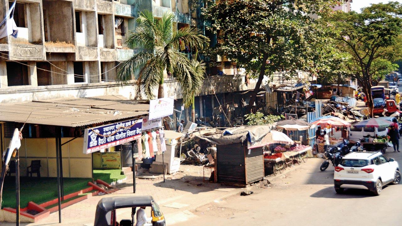 A day after the clashes at Hyderi Chowk, local authorities demolished several illegal extensions to shops in the area. Ironically, the last structure in this same row is the Mira Road police station