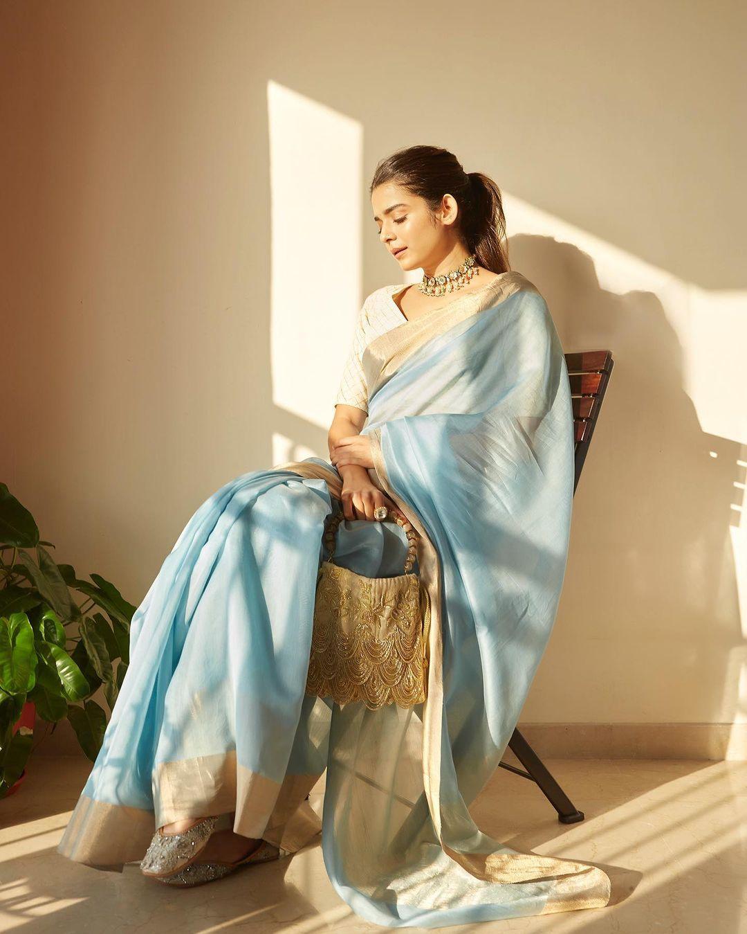 Mithila Palkar stuns in a vibrant blue saree, perfect for any occasion. Whether it's a family gathering or a friend's wedding, this look guarantees praises