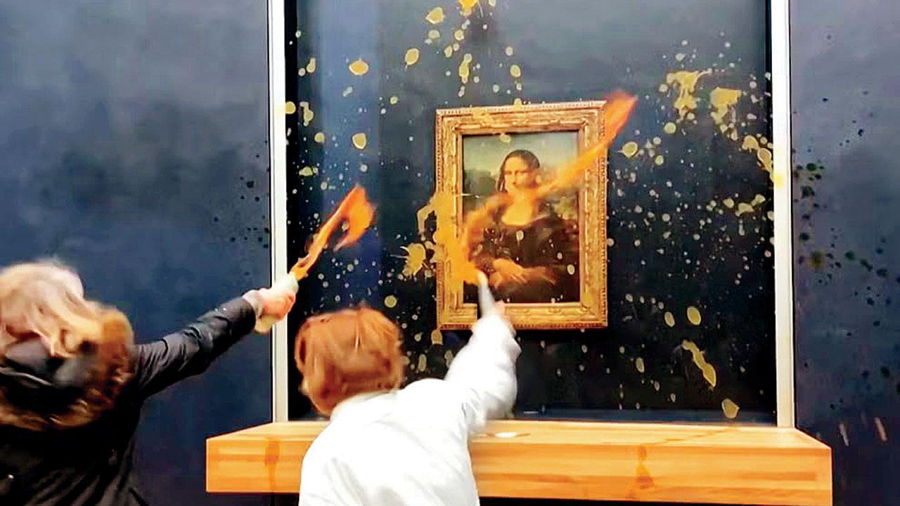 Green activists throw soup at Mona Lisa