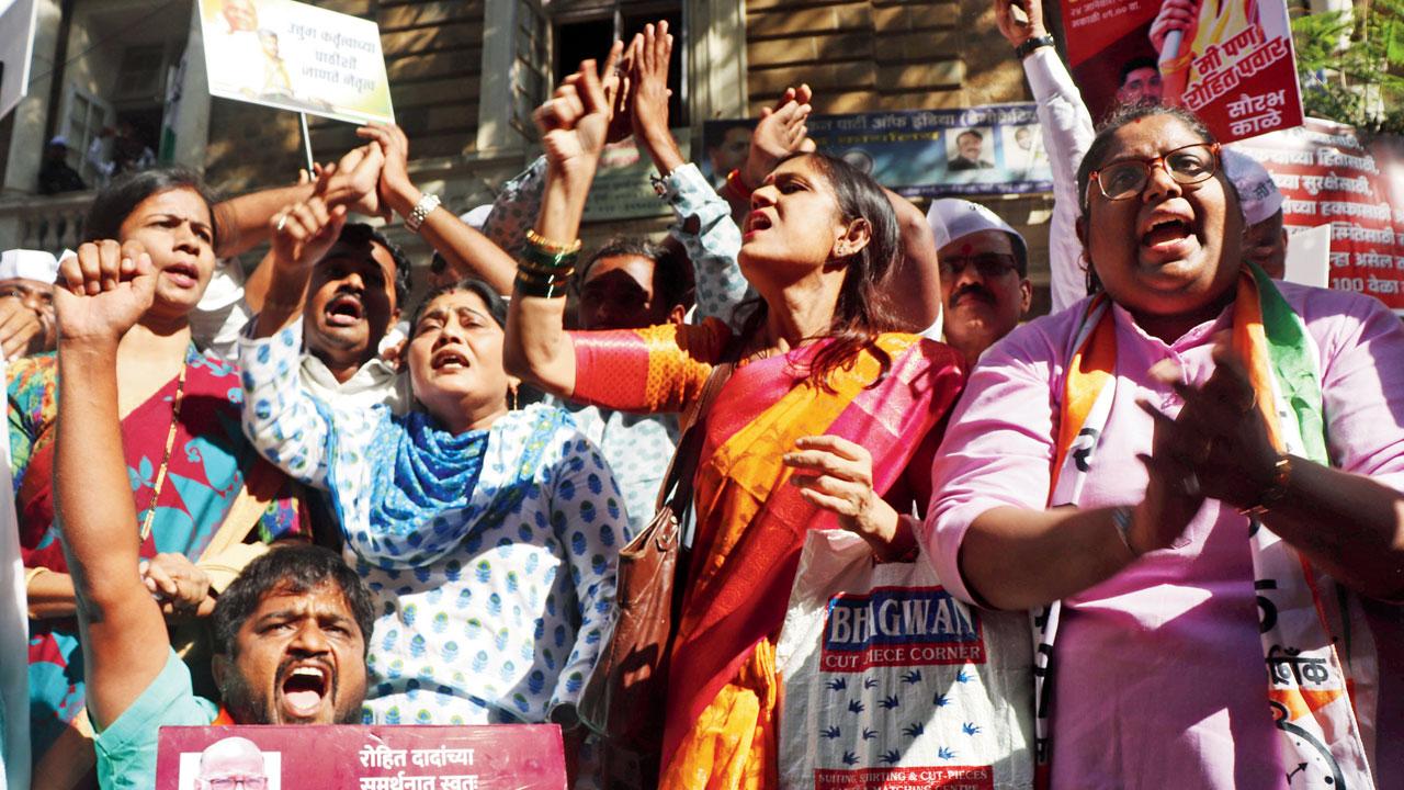 NCP supporters protesting outside the part office on Wednesday. Pic/Anurag Ahire