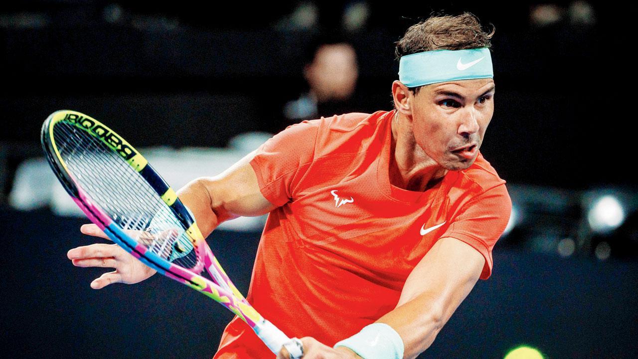 Returning Nadal roars into quarters