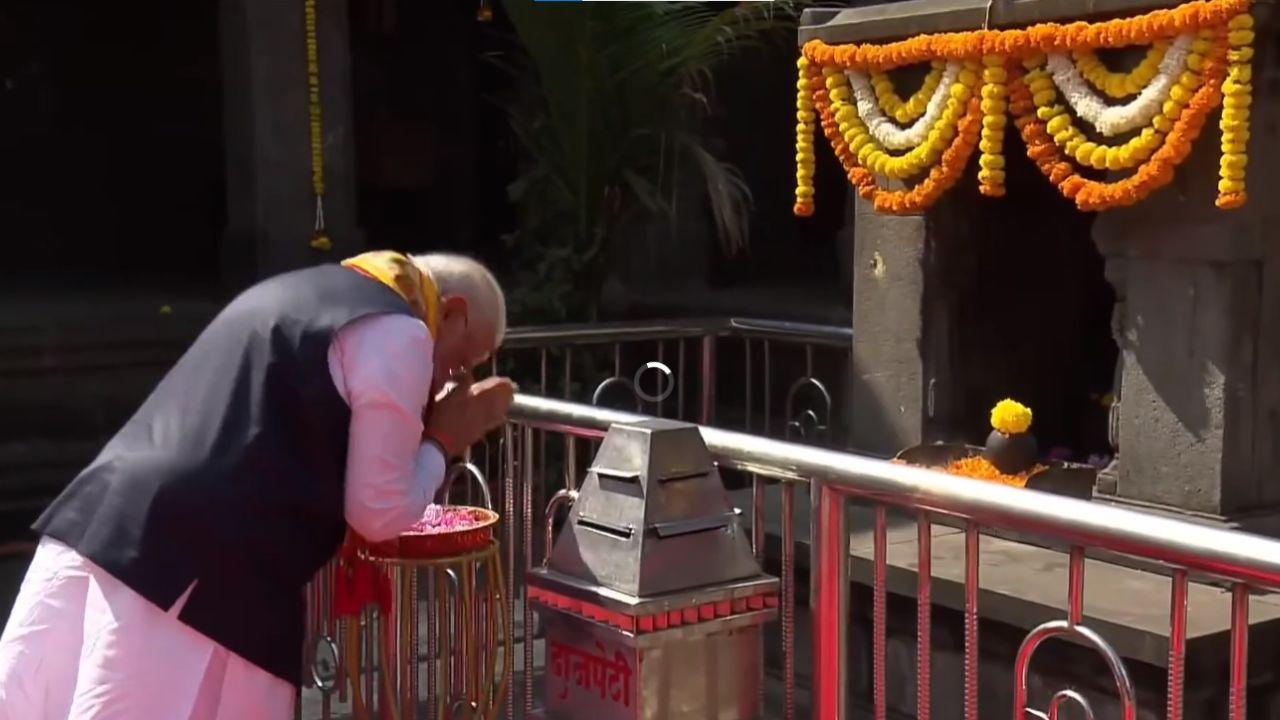 Modi played 'taal' (cymbals) along with other devotees connecting with the cultural and devotional practices at the shrine.