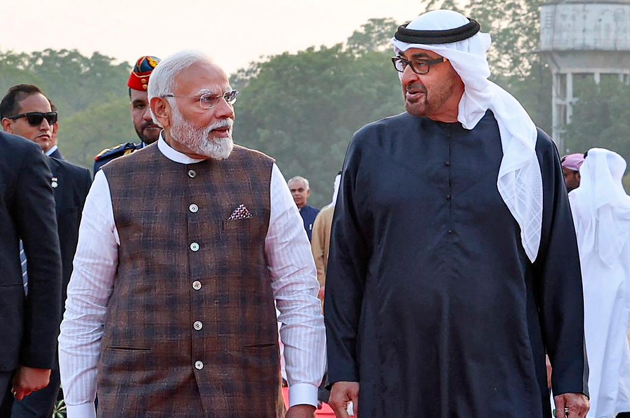 The two leaders shook hands as they exchanged greetings minutes before the summit commenced in Gujarat