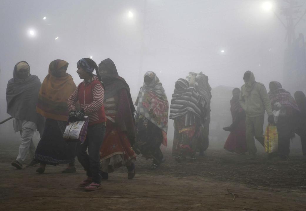 In Photos: Dense fog blankets north India