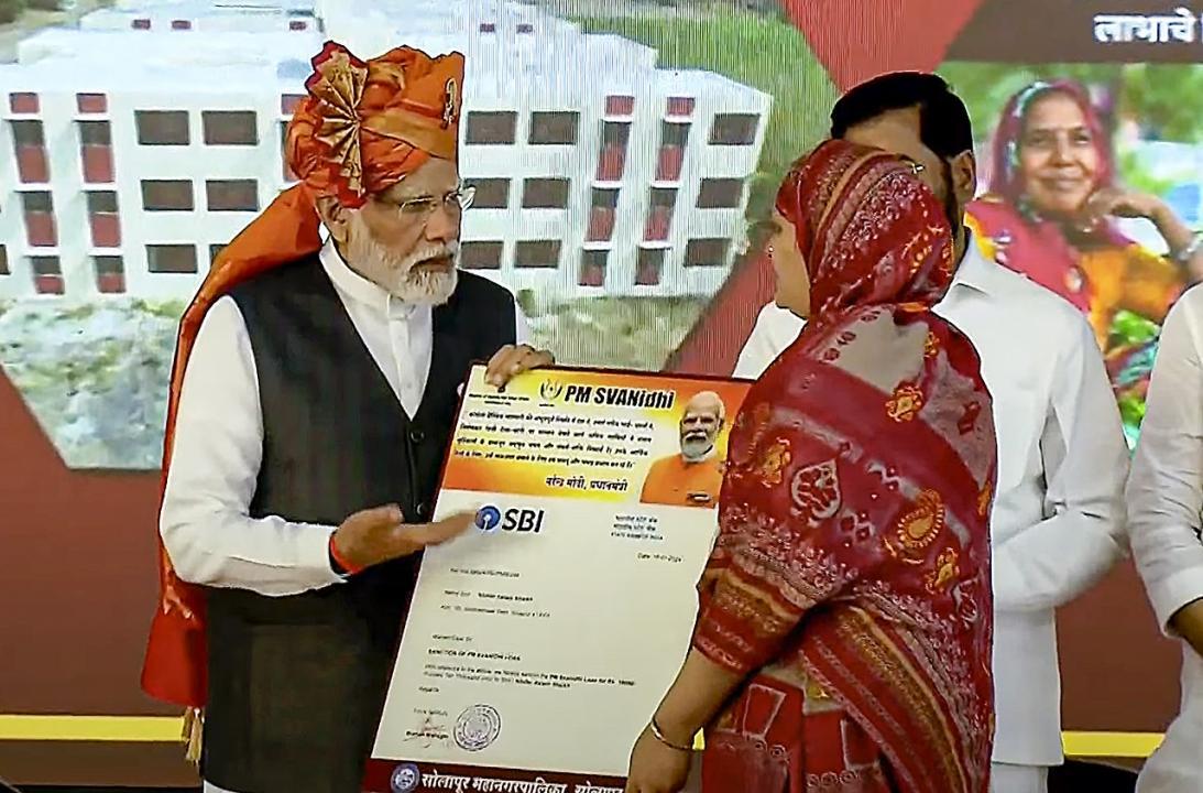 In Photos: PM Modi hands over 15,000 houses for EWS to beneficiaries at Solapur