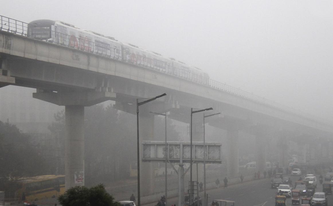 In Photos: Dense fog shrouds Delhi; hampers flight, train operations