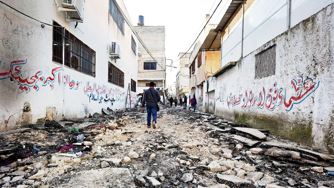 Damaged buildings in Gaza Strip. Pics/AP