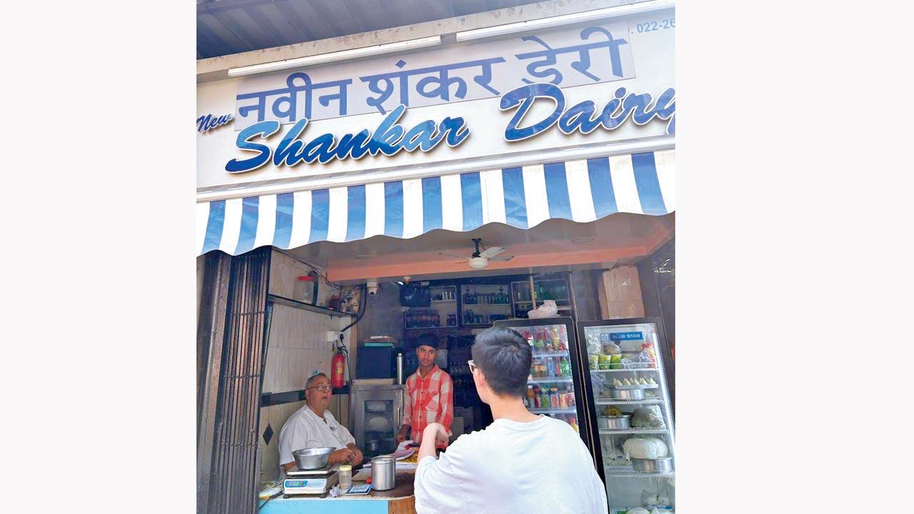 Shishido orders chaas and lassi at the dairy