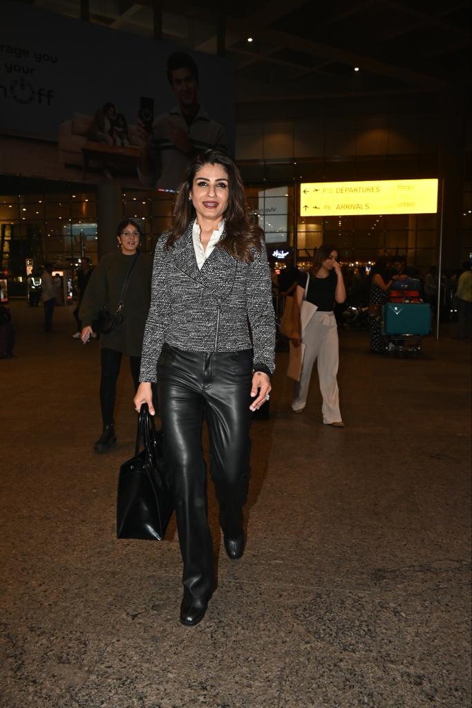 Raveena Tandon was clicked is smart outfits as she returned to the city