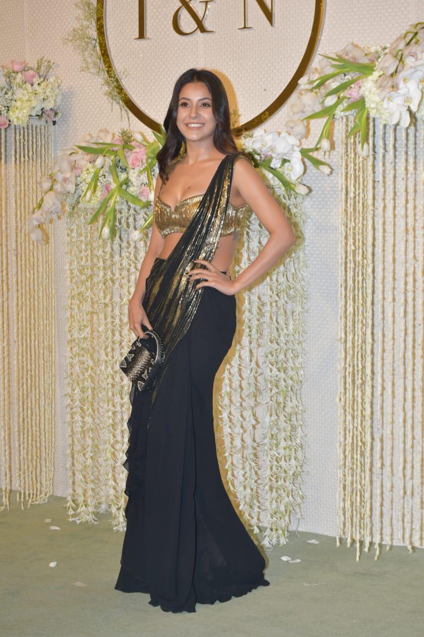 Shehnaaz Gill attended the reception party of Ira and Nupur, looking stunning in a black saree