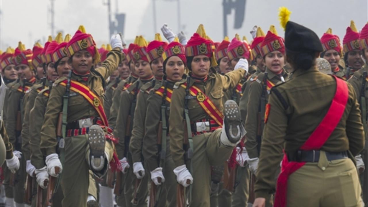 Women personnel of Border Security Force (BSF) during rehearsal for the Republic Day Parade 2024 amid morning fog, in New Delhi on Saturday