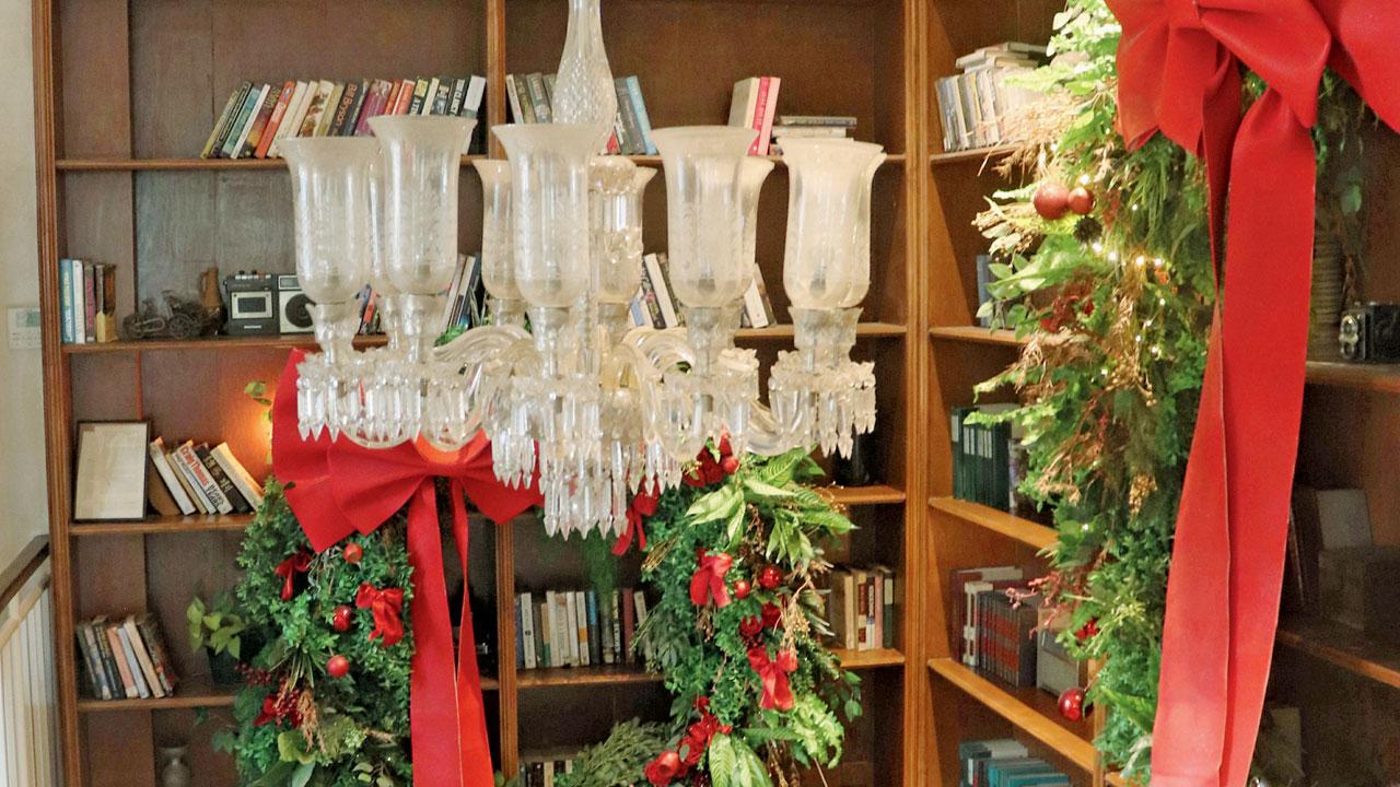 A winding staircase at Eve gives patrons a closer look at its ceiling-to-floor library, home to books and vintage knick-knacks