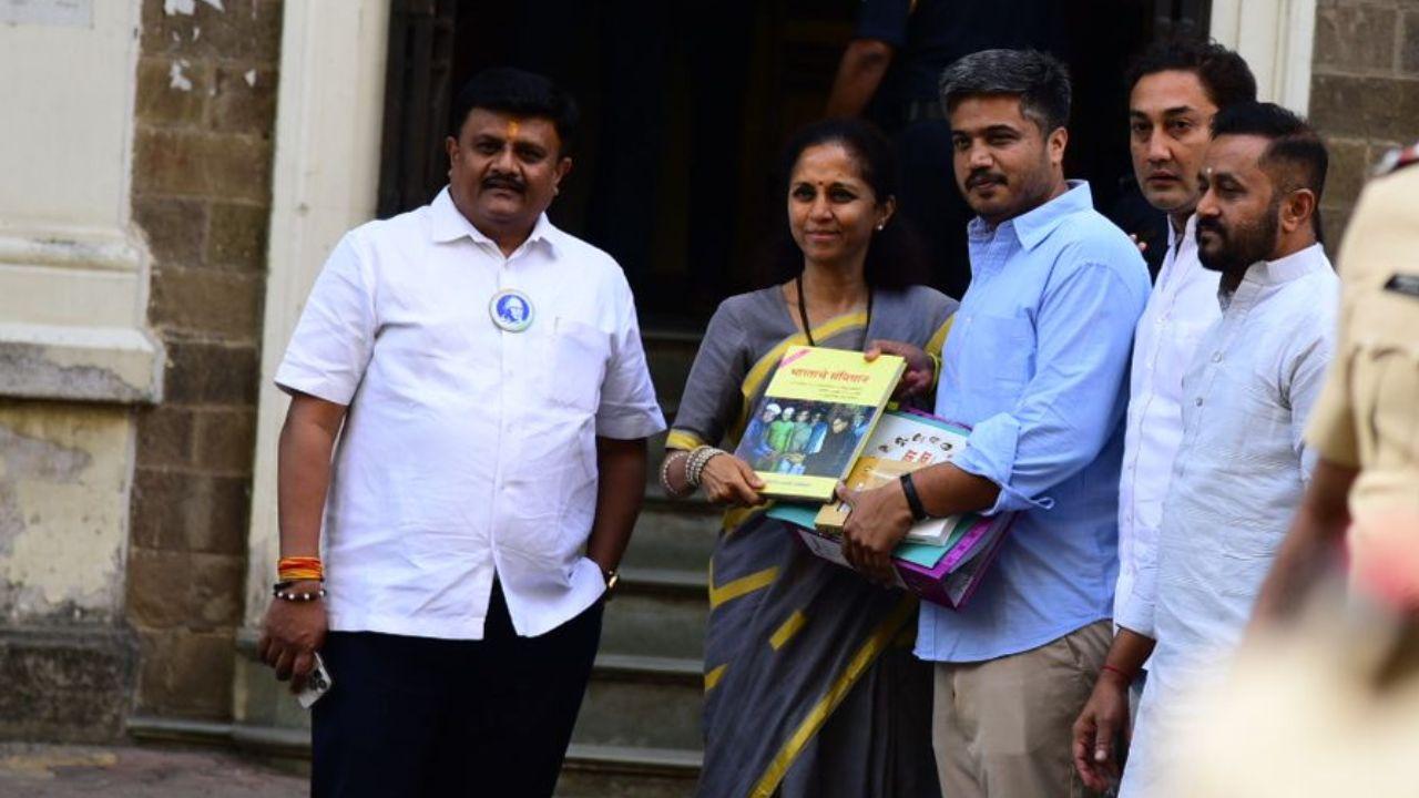 He arrived at the ED office with a book in his hand and was accompanied by party leaders, including his aunt Supriya Sule. 