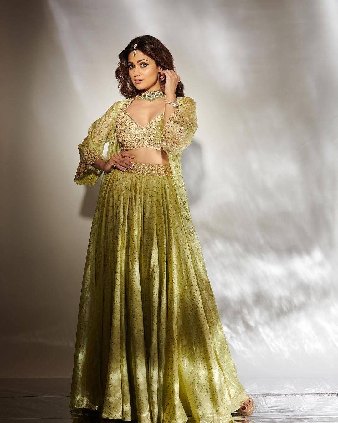 Shamita Shetty dazzles in an Indo-western look, donning a green printed long skirt with a prominent border