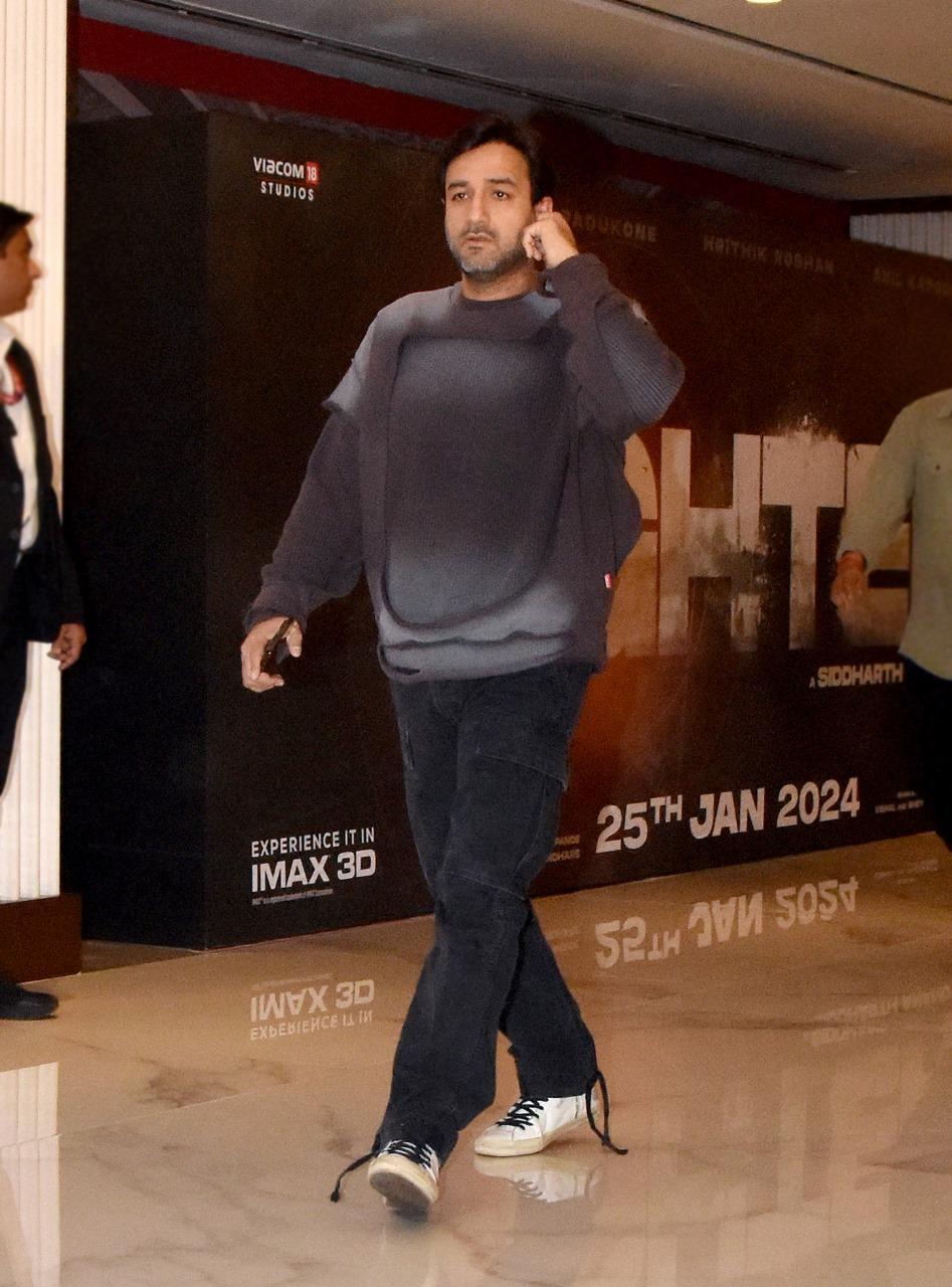 Sidharth Anand was clicked as he went to attend Fighter's trailer launch event