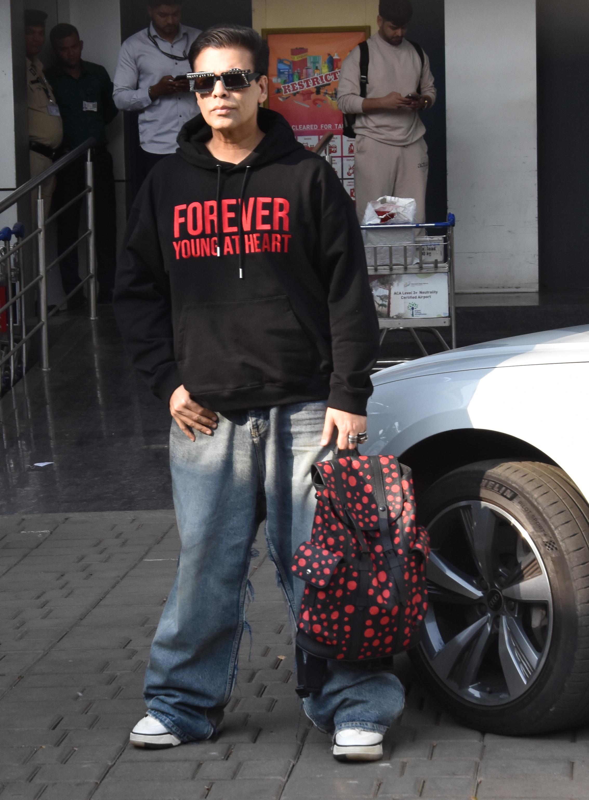 Karan Johar aced his airport look in cool hoodie and comfy jeans as he got clicked