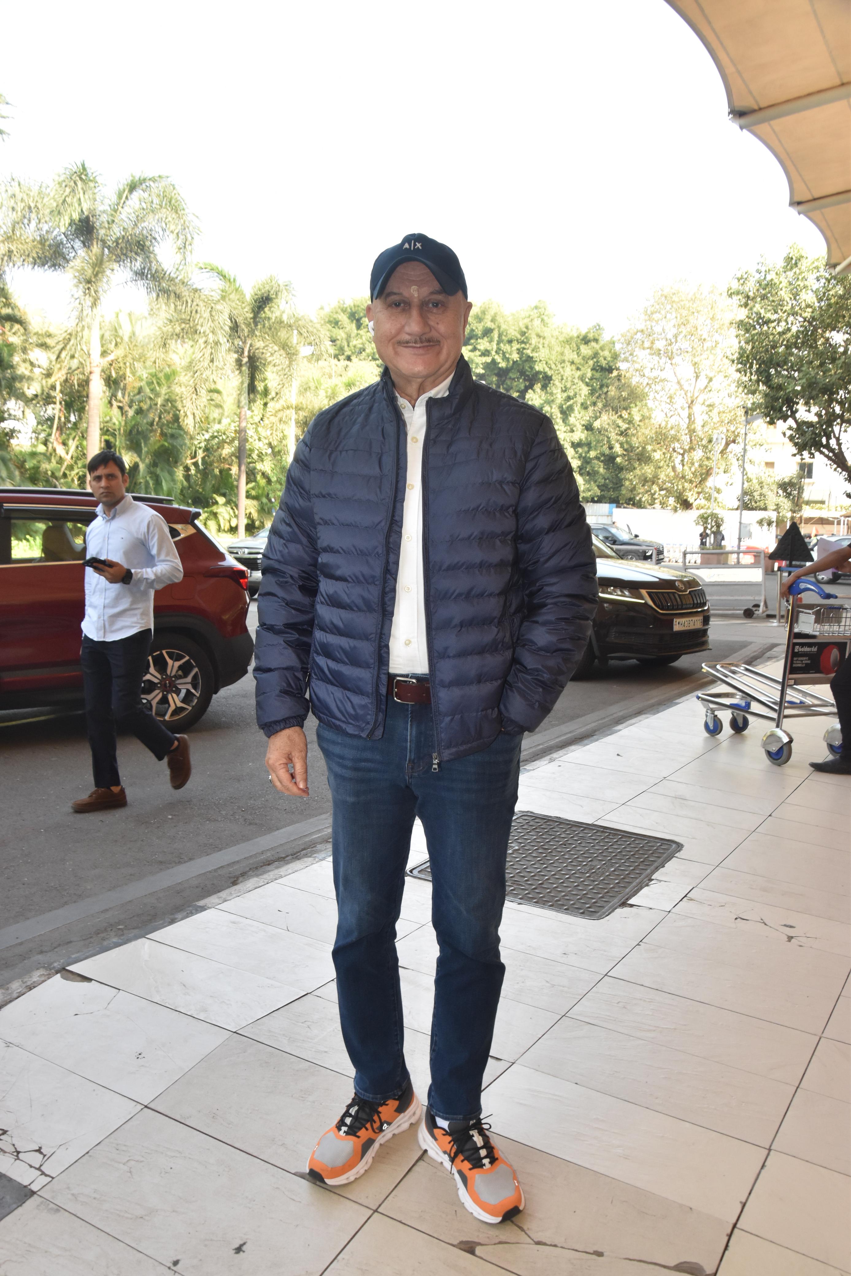 Anupam Kher was snapped at airport as the actor jetted off for the grand ceremony in Ayodhya