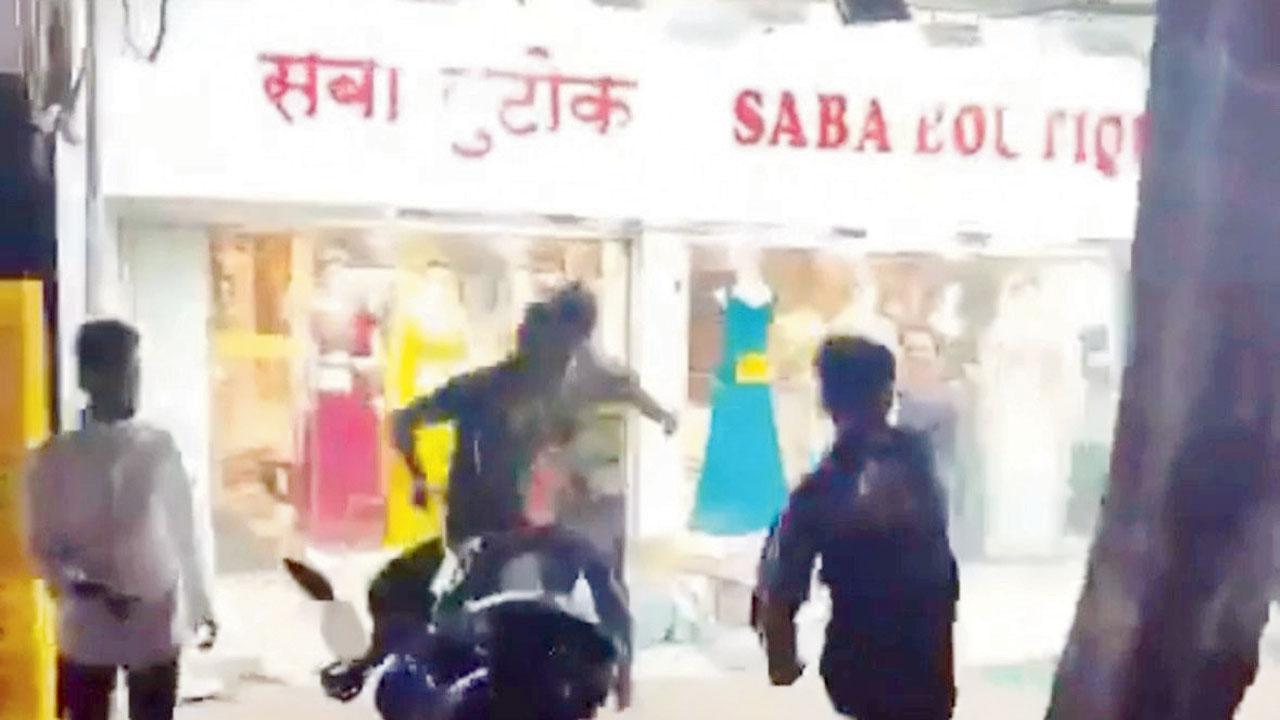 Mob pelting stones on shop in Shanti Nagar