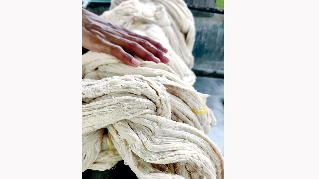 A pile of unbleached yarn spun on the Ambar Charkha, a mechanical tool that allows for faster spinning without the use of electricity