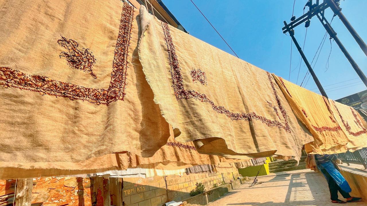 Discovering Roots’ Khadi Pashminas out to sun dry. Traditionally, Kashmiri Pashminas were said to gain a lustre from the Valley’s waters. Now, the final round of washing is done mainly by the banks of the Jhelum where washermen pound the dainty shawls at the ghat