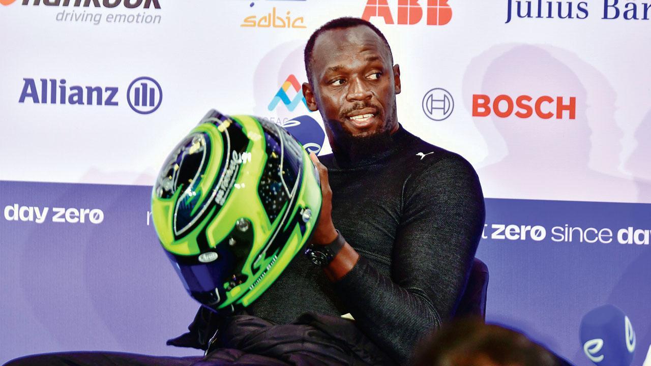 Bolt drives fastest Formula E car indoors
