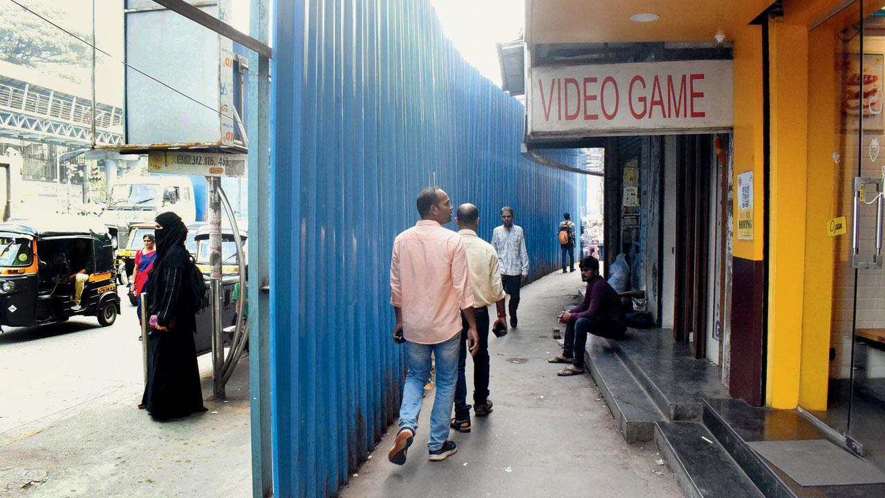Mumbai: Decades-old shops take a hit as CR barricades area around Sion bridge ahead of its demolition