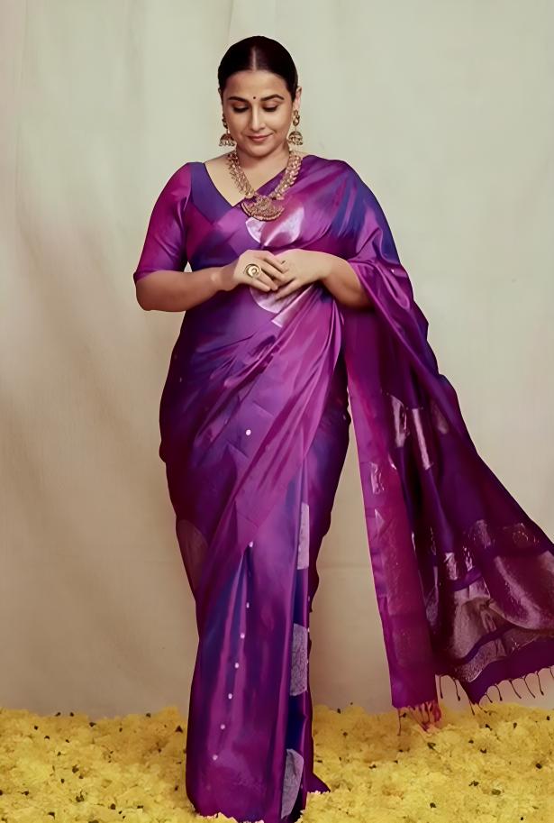Purple is one of the most vibrant colors to wear to a party, and Vidya's saree proves this right