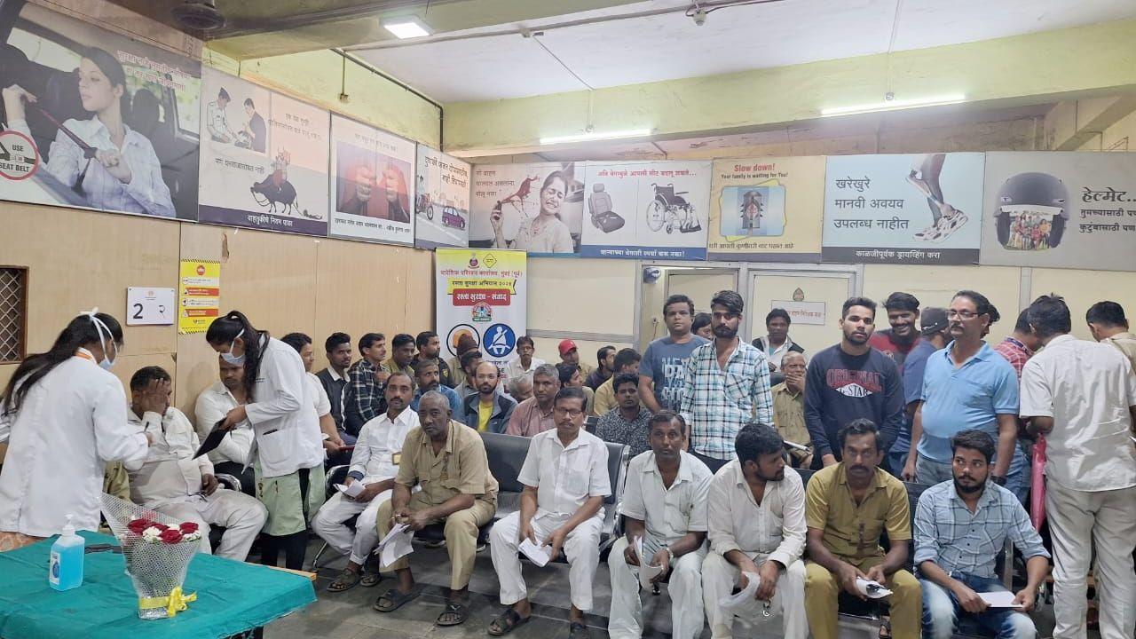 A team of doctors speaks to a driver at the Wadala RTO on Wednesday