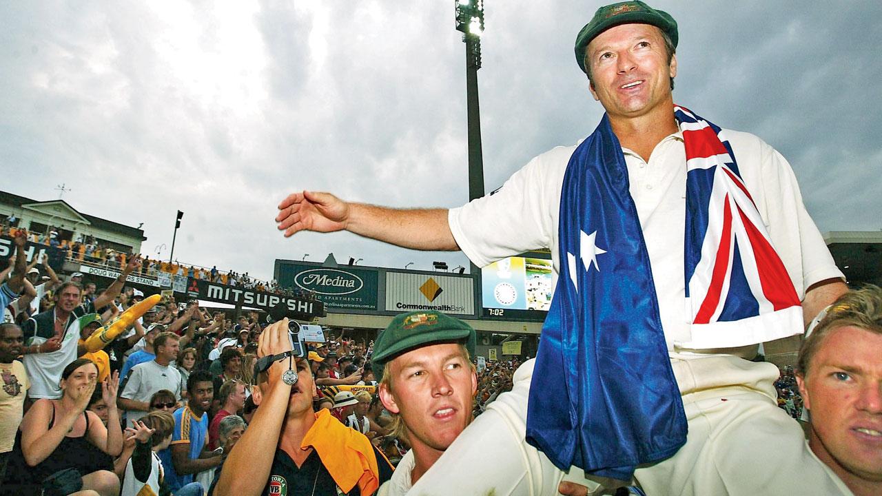 Steve Waugh is lifted by his Australia teammates during a lap of honour after Day Five of the fourth Test against India at the Sydney Cricket Ground on January 6, 2004. PIC/Getty Images