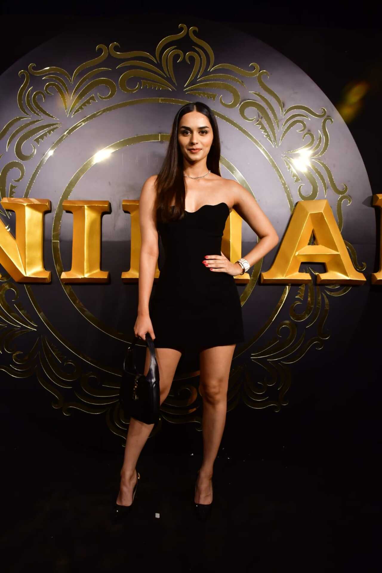 Manushi Chhillar graced the party in a little black dress