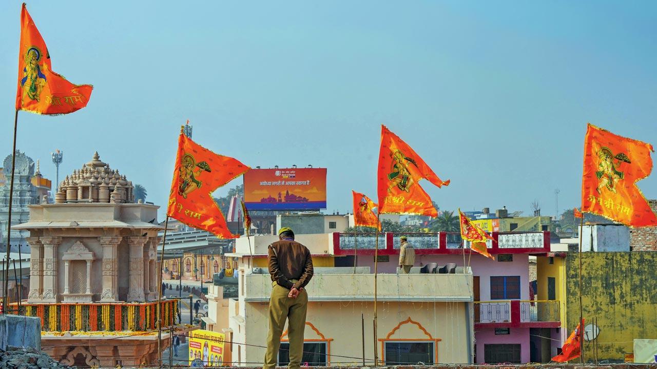 Police personnel keep a watch ahead of the ceremony. Pic/PTI  