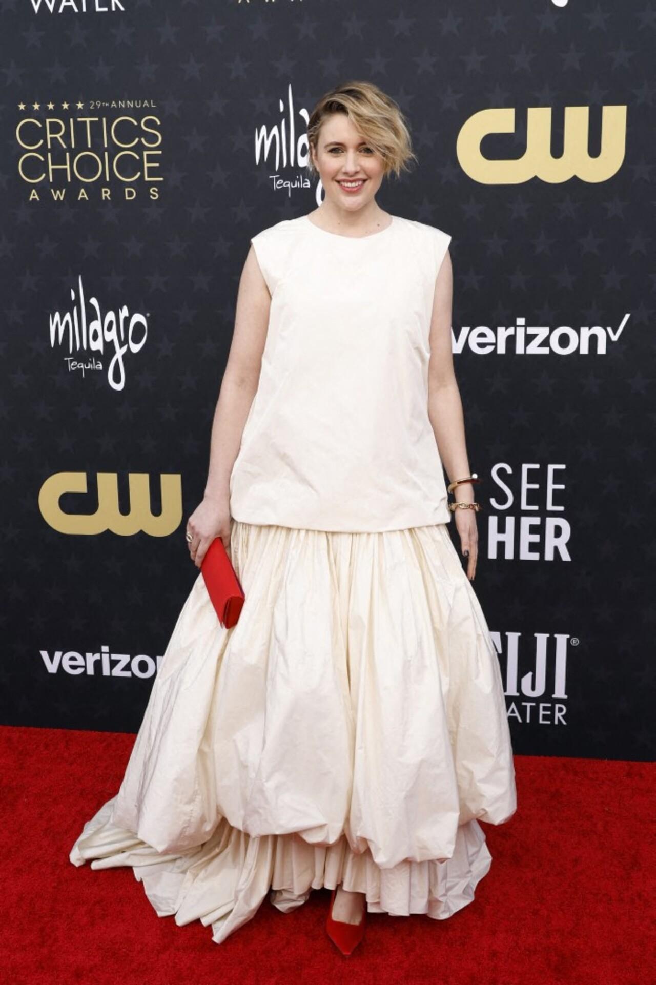 Greta Gerwig, director of the highest grossing film Barbie, opted for a flowy white gown for the night