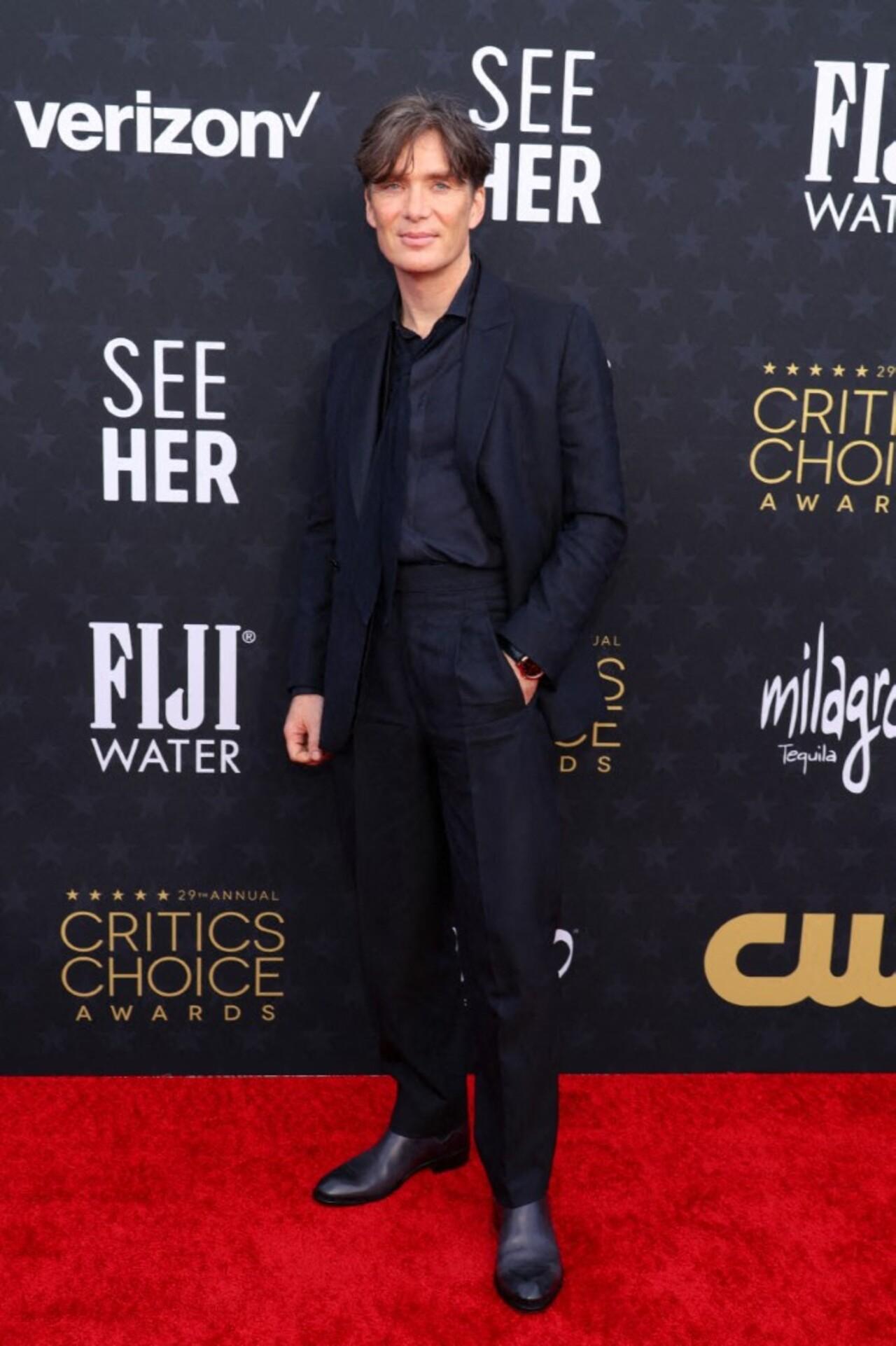 Cillian Murphy looked smart in an all-black outfit and struck a cool pose on the red carpet. The actor was nominated for his role in Oppenheimer