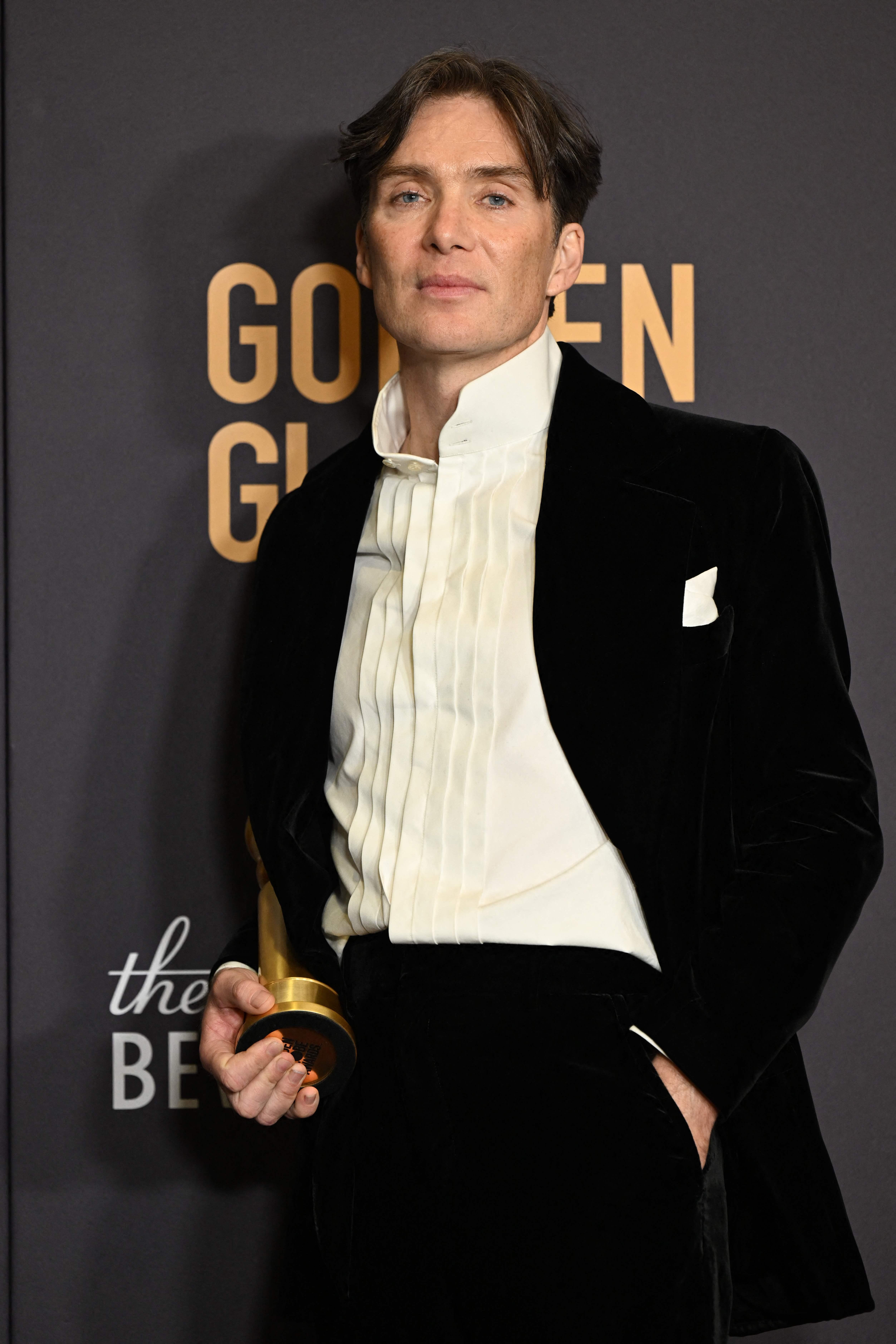 Irish actor Cillian Murphy poses in the press room with the award for Best Performance by a Male Actor in a Motion Picture - Drama for 