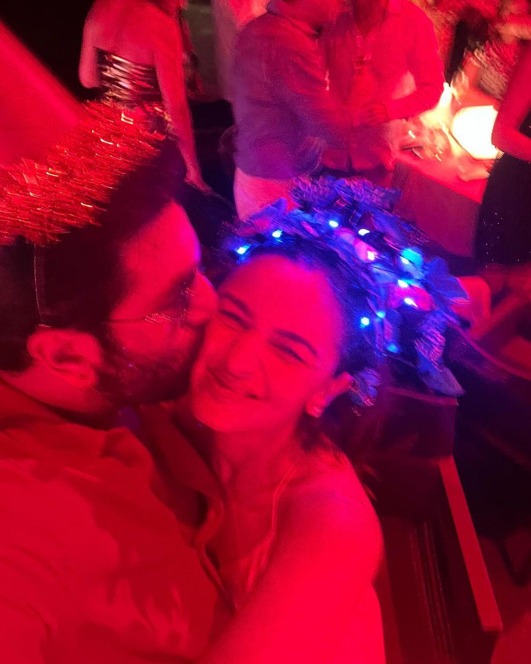 Alia Bhatt has recently posted a set of pictures on her social media account, revealing how she started the new year. One of the pictures shows Ranbir Kapoor giving a peck on Alia's cheeks, and it's absolutely adorable