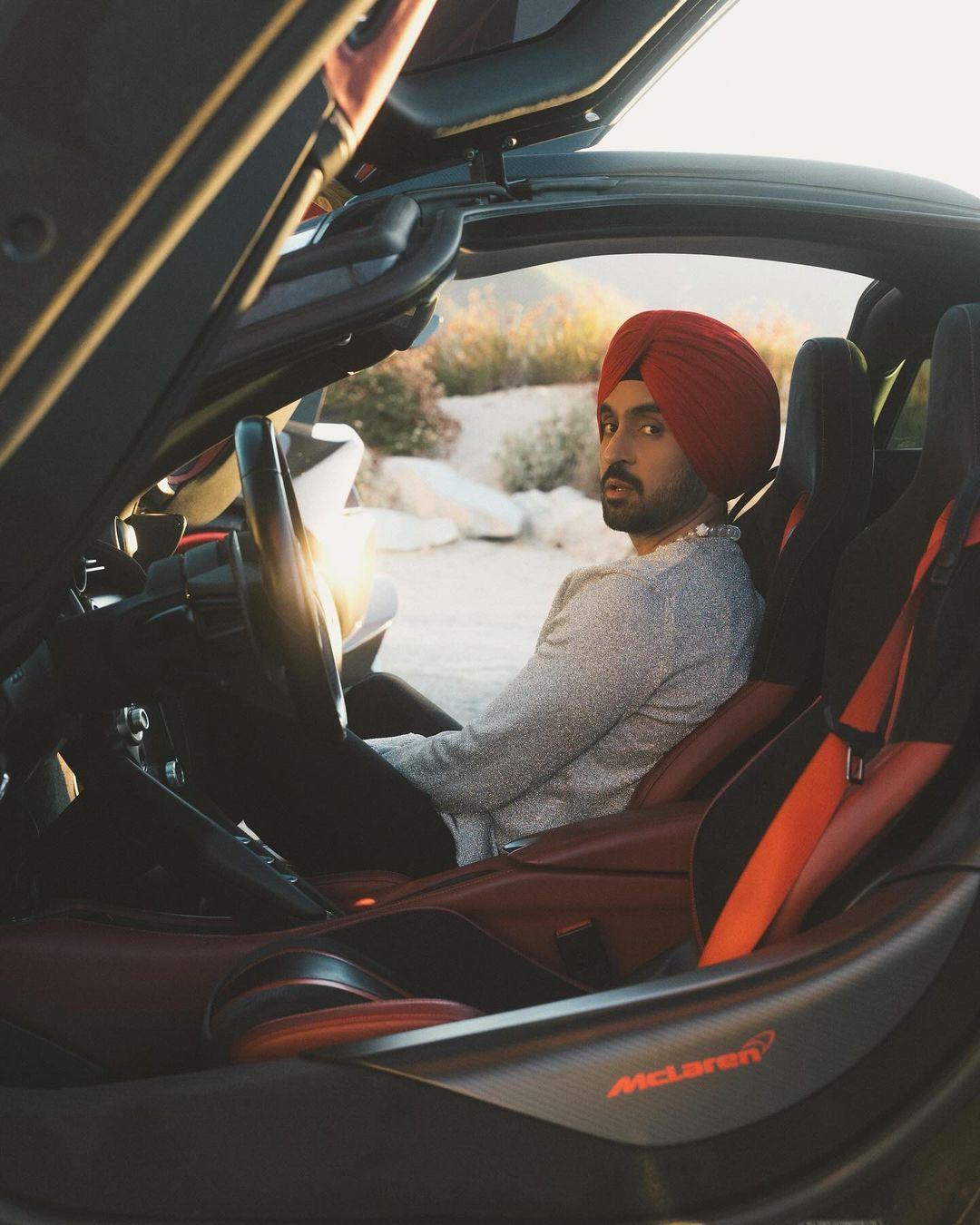 Diljit continues to up his own 'cool' game. The way the singer poses in the car while on his A-game style-wise. We can hardly take it!