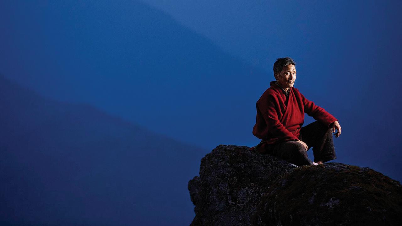 Soni’s photograph features the Brokpa nomad Tsering atop a rock near his remote village in Lubrang in the Eastern Himalayas