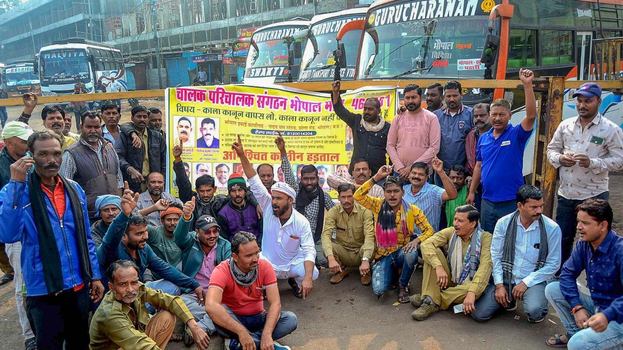 Bus and taxi drivers protest during their strike over the “stringent provisions” under proposed legislation on hit-and-run cases under Bharatiya Nyaya Sanhita 2023, in Bhopal, Monday. Pics/PTI
