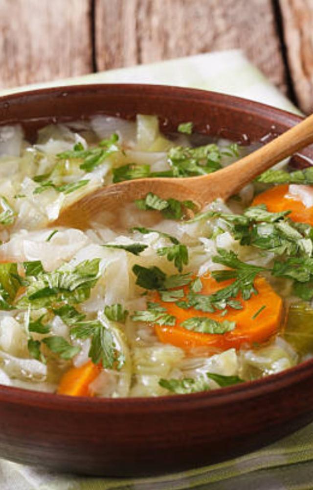 It involves consuming large quantities of cabbage soup and a specific list of other foods for seven days
