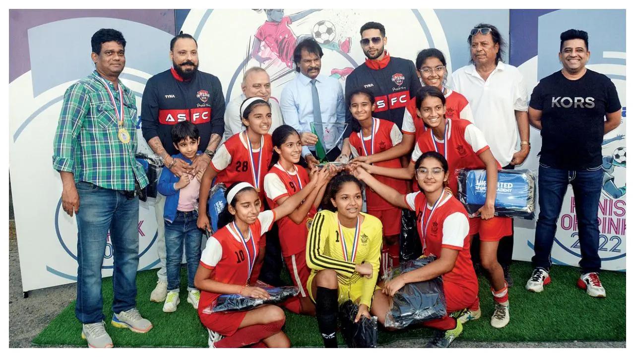 The Mid-Day's Ranis of Rink 2022 title was won by the Arya Vidya Mandir school team (Juhu). The football team and coach Desmond D’Souza is seen posing with the trophy after securing the win against Dhirubhai Ambani International School